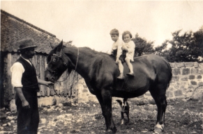 Mary and her brother on horseback